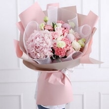 1 Stem of Pink Hydrangea, 6 Stems of Pink Carnations, 3 Stems of Blush Pink Roses