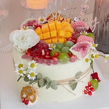 Round Forest-Themed Fruit Cake with Fresh Fruits and Toppings