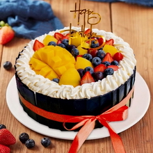 Round Fruit Cake with Assorted Fruit Decorations