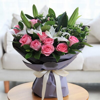 11 Stems of Pink Roses & 2 Stems of Multi-bloom White Lilies