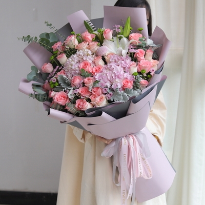 33 Stems of Aisha Roses, 1 Stem of Multi-bloom White Lily, 2 Stems of Pink Hydrangea
