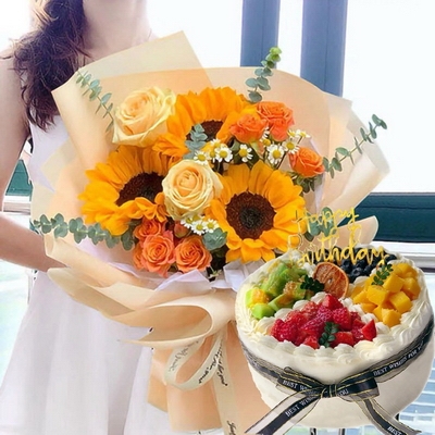 3 Stems of Sunflowers & 2 Stems of Champagne Roses + Round Fruit Cake