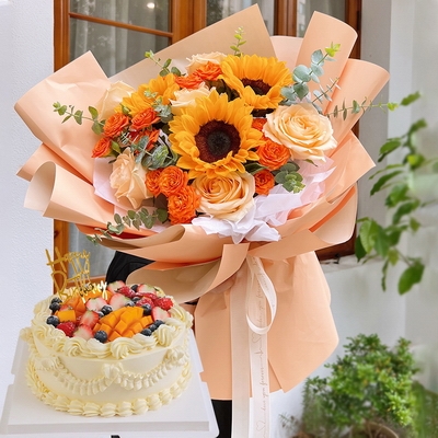 6 Stems of Champagne Roses, 3 Stems of Sunflowers & Round Fruit Cake