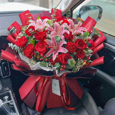 11 Stems of Red Roses, 8 Stems of Red Carnations & 3 Stems of Multi-bloom Pink Lilies