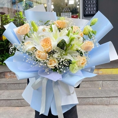 11 Stems of Champagne Roses & 2 Stems of Multi-bloom White Lilies