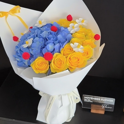 12 Stems of Yellow Roses & 2 Stems of Blue Hydrangeas